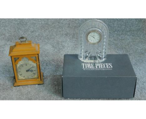 A wooden cased miniature four glass mantel bracket clock by Sewell Ltd. of London and a Waterford Chrystal mantel clock in bo