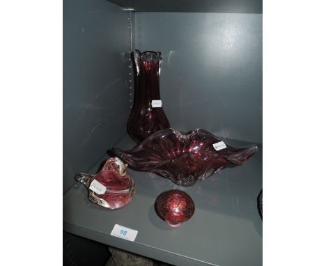A selection of ruby red glass wares