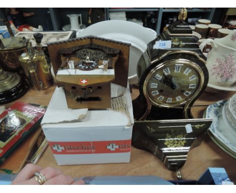 A bracket clock by Comtesse and cuckoo clock
