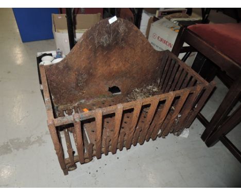 A cast iron dog grate