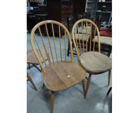 A pair of Ercol hoop and stick back chairs