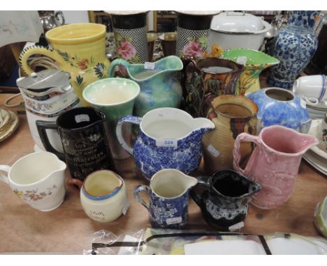 A selection of ceramic jugs including hand decorated art deco