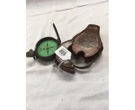 AN ARMY STYLE PRISMATIC MARCHING COMPASS WITH LEATHER CARRY CASE