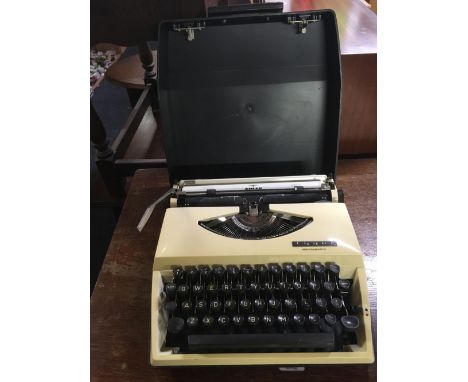 ADLER PORTABLE MANUAL TYPEWRITER WITH CARRY CASE