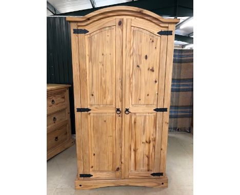 Small pine wardrobe with hanging rail and shelf internally, approx 98cm x 55cm x 184cm tall