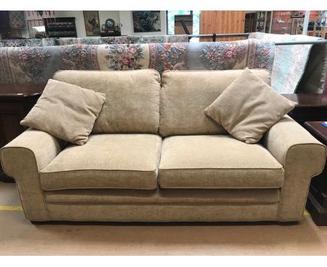 Modern fawn fabric two/three seater sofa, approx 200cm in length