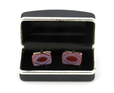 A pair of boxed 925 silver carved cornelian cufflinks.