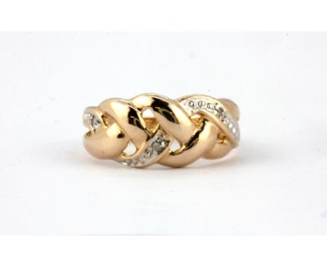 A 9ct rose gold diamond set ring, (K.5).