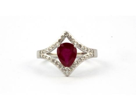 A 925 silver ring set with a pear cut ruby and cubic zirconia, (M).