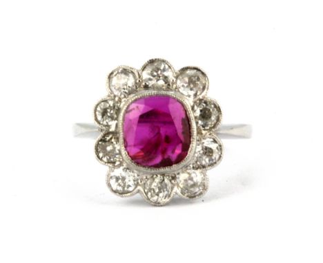 A 950 platinum cluster ring set with an untreated Burmese ruby surrounded by brilliant cut diamonds, approx. 2.16ct ruby, 1ct