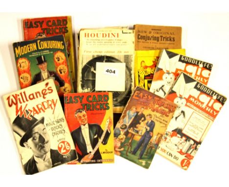 A group of vintage books on stage magic.