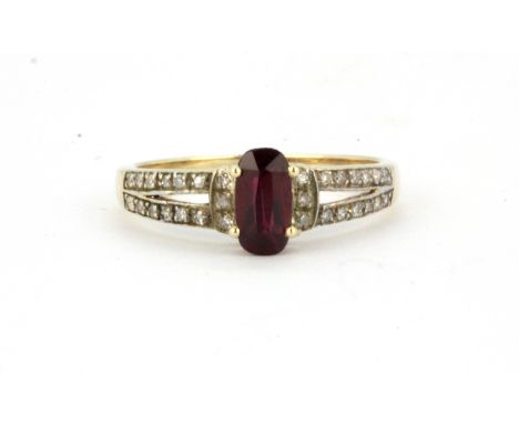 A 9ct yellow gold ring set with a natural untreated ruby and diamond set shoulders, (L.5).