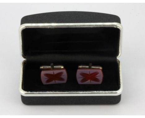 A pair of boxed 925 silver carved cornelian cufflinks.