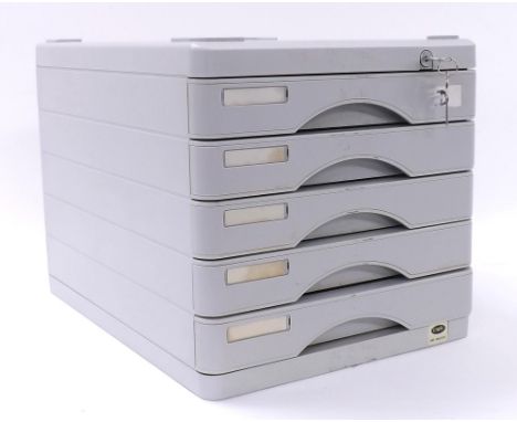 Five drawer chest containing a quantity of watchmakers parts and tools to include crowns, stems, case backs, glasses, screw d