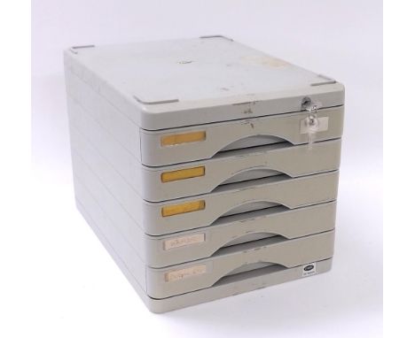 Five drawer chest containing a quantity of watch and clock makers parts to include watch and pocket watch bezels, cases and b