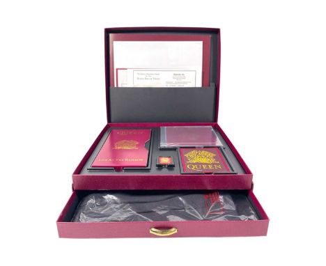A superb example of the official Queen fan club issued 'Box of Tricks' set with VHS, CD, patch, badger, t-shirt etc all as ne