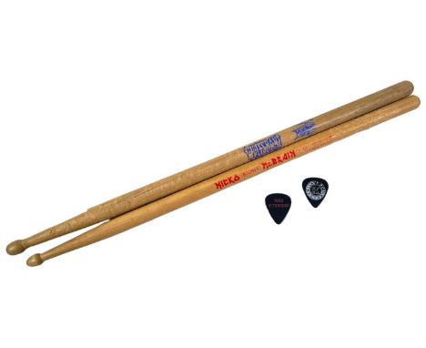 A likely concert used Iron Maiden Nick McBrain 'Shawstix' drumstick, a similar 'Wolfsbane' example, King of The Hill plectrum