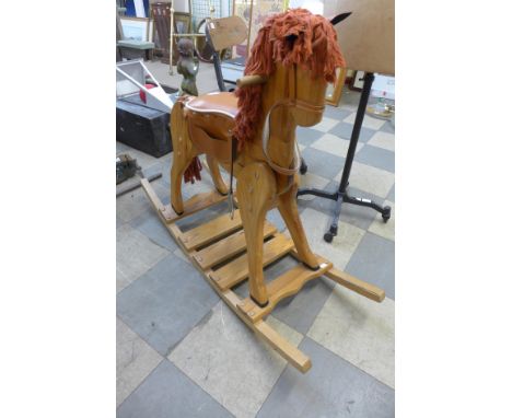 A pine rocking horse 