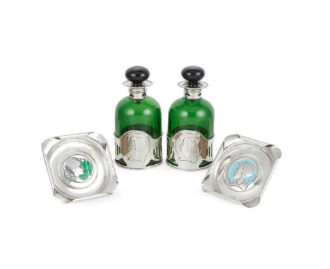 KATE HARRIS (BRITISH 1878-1949) FOR WILLIAM HUTTON &amp; SONS LTD. TWO SCENT BOTTLES, 1904 AND 1909 green glass with silver m