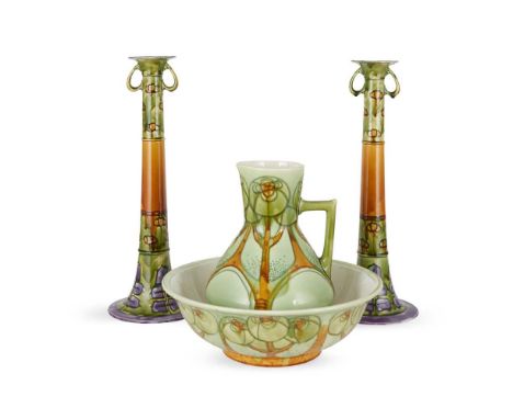 MINTONS LTD. PAIR OF TALL ‘SECESSIONIST WARE’ CANDLESTICK HOLDERS, CIRCA 1902-14 tube-lined and slip-glazed earthenware, prin