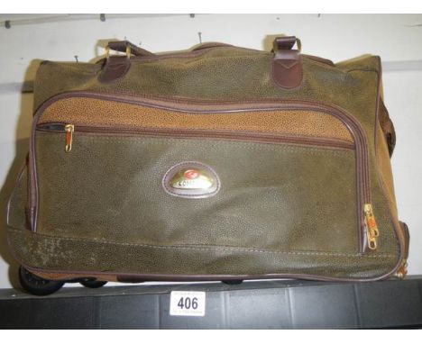 A Compass holdall with wheels.