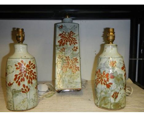 Three mid 20th century studio pottery lamp bases.