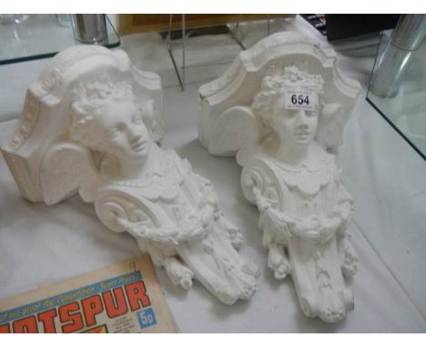 A good pair of plaster shelf brackets.
