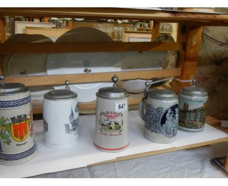 A shelf of lidded beer steins, COLLECT ONLY.