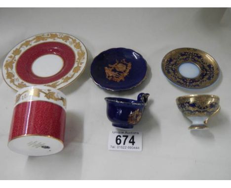 A mid 20th century cups &amp; saucers and two others.