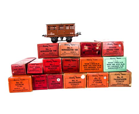 Boxed Hornby O Gauge Post-war Rolling Stock, comprising No 51 1st, 2nd, 3rd class and passenger brake, two No 41 coaches and 