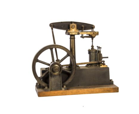 A Classic Stuart Turner Live Steam Beam Engine, complete and mounted on a pinewood base 13" x 5", with Watt's parallel link m