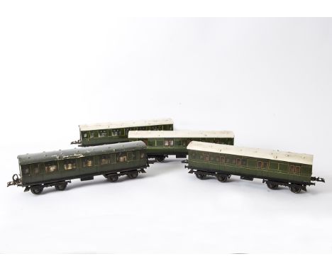 Four Hornby O Gauge No 2 Corridor Coaches,  all in SR green, comprising two 3rd class coaches, one G-VG, the other P-F, and t