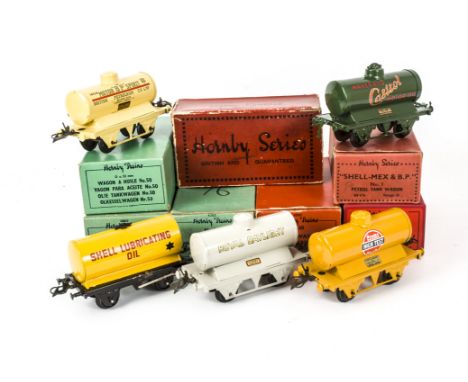 Boxed Original Hornby and Unboxed Refinished O Gauge Tank Wagons, No 50 Shell Lubricating Oil tankers (4 boxed, 1 unboxed), b