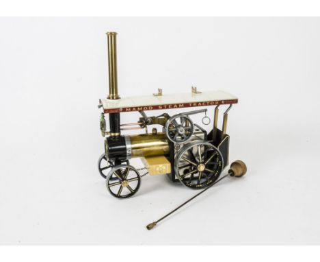 An 'Improved' Mamod TE1A Traction Engine, re-finished in polished brass with black detailing and gold lining, additional fitt