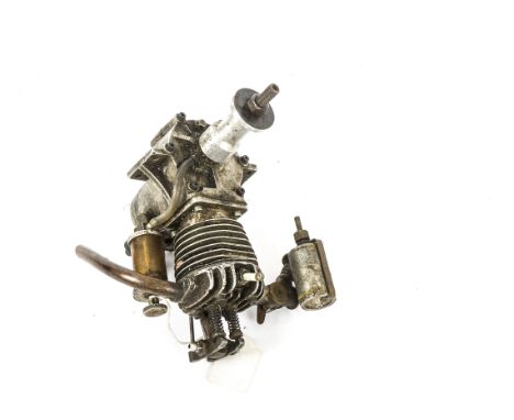 A 1.5cc 'Kiwi' Petrol Aero Engine by Edgar Westbury, made circa 1935, with outside valve pushrods, contact points and carbure