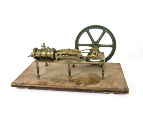 A Single-Cylinder Horizontal 'Table Engine', the cylinder mounted on a cast brass frame, supported on 6 legs from a walnut-ve