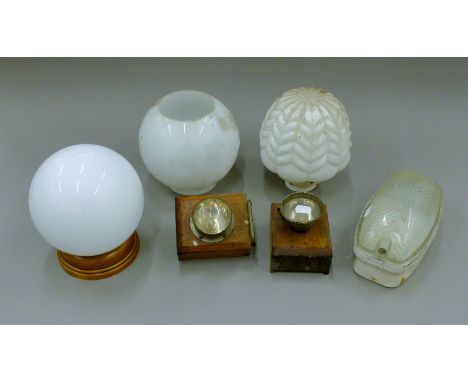 A quantity of various vintage lamps and shades. The largest 21 cm high.