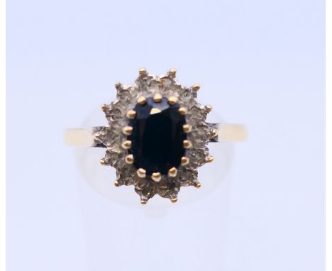 A 9 ct gold dress ring. Ring size U.