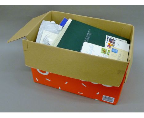 A box of First day covers.