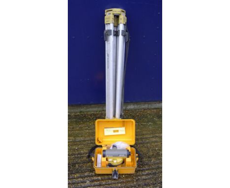 A Surveyor's Level AT-G7N and tripod.  The tripod 102 cm high. 