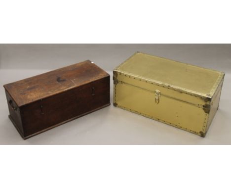A 19th century truck with brass handles and a later metal trunk. The former 81.5 cm long.