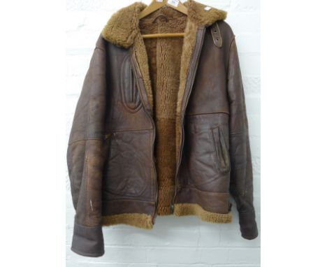 A vintage leather flying jacket labelled Echtes Leader, Made in Italy, size label for XXL.