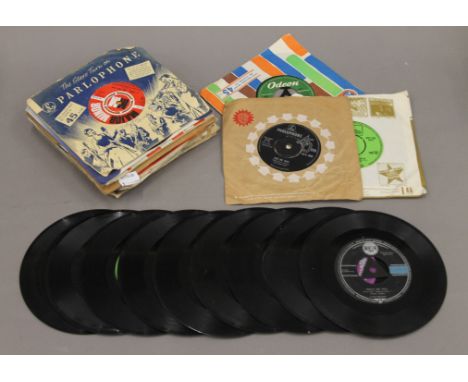 A quantity of 45 rpm records including Elvis Presley, The Rolling Stones etc.