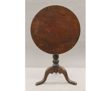 A 19th century mahogany tilt top tripod table. 62 cm diameter.