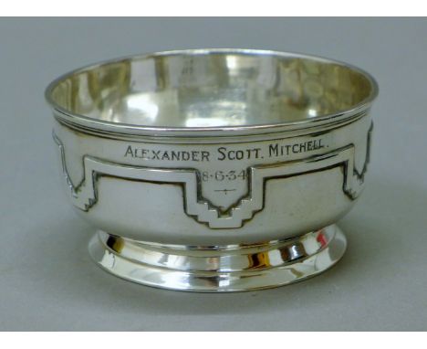 An Art Deco silver sugar bowl inscribed Alexander Scott Mitchell 8.6.34.  10 cm diameter. 147 grammes. 