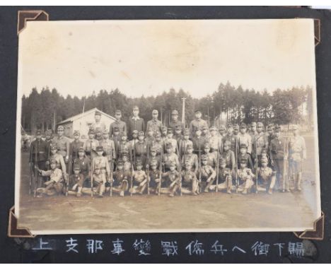 Two Japanese Photograph Albums, showing military action in China, interesting atmospheric images with troops preparing for ac