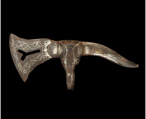 8th-10th century AD. An iron axehead with tubular socket and languettes, curved blade with Y-shaped void, inlaid silver scrol