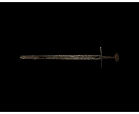 12th century AD. A hand-forged iron sword comprising a narrow two-edged blade with shallow fuller to both faces, short ricass