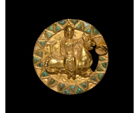 Late 1st millennium BC. A gold 'Sarmatian Animal Style' disc mount with band of inset turquoise triangular inserts to the rim