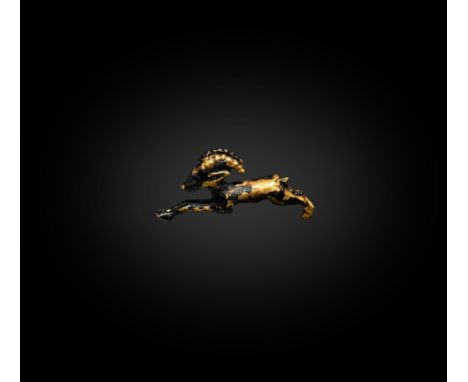 New Kingdom, 1550-1070 BC. A gold amulet of a leaping gazelle with extended forelegs and prominent curved horns. See the Baro